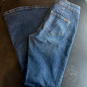 Brand new, never worn rock and rolll bell bottom jeans size 27-32
